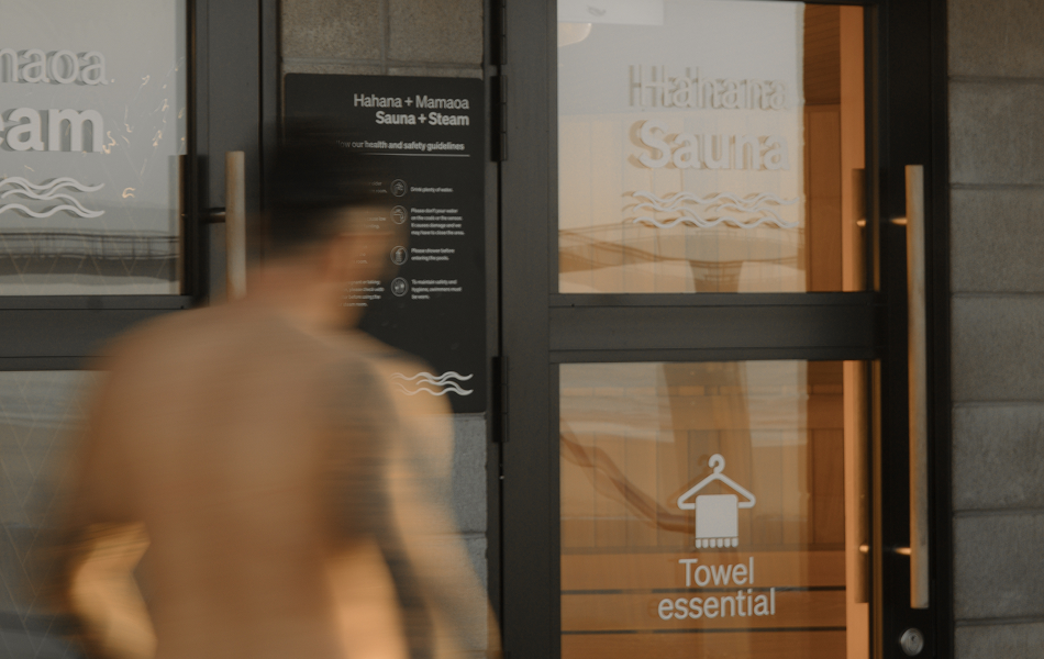 Blurred figure entering the sauna and steam room area